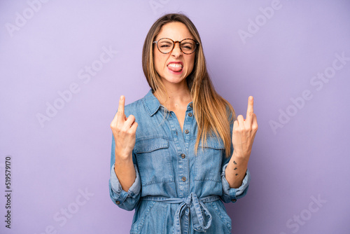 Φωτογραφία pretty young adult woman feeling provocative, aggressive and obscene, flipping t