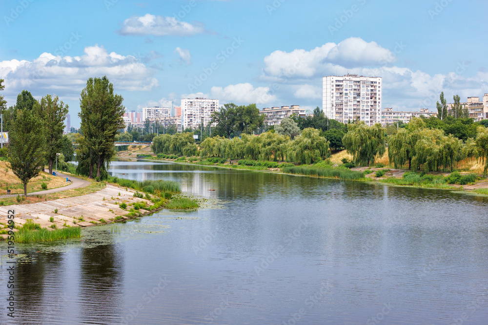 Embankment of the Rusanivka district in Kyiv on a summer day.