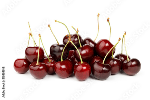 Red berries on a white background, ripe cherries.