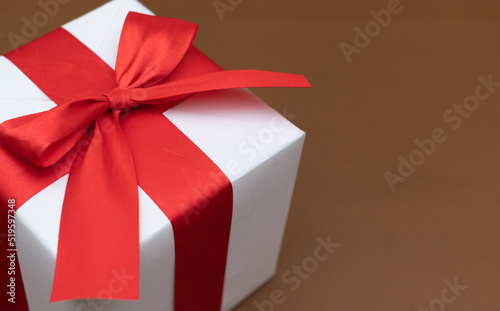 white gift box red ribbon