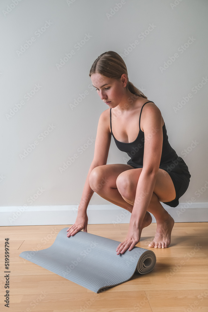 Sports fit home.Girl goes sports, fitness, yoga, meditative breathing practices.Meditation, relaxation,mental health. Active lifestyle, personal care, health.Wellness,workout,physical health.Smart fit