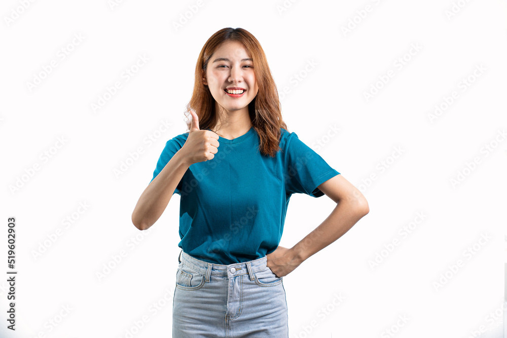 Obraz premium A cheerful and graceful Asian woman smiles happily and makes various hand gestures on a white background.