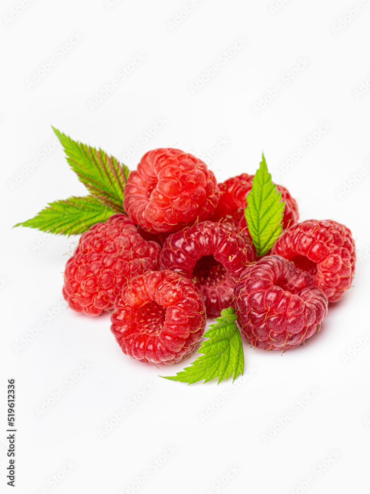 Ripe raspberries with leaf isolated on a white background Ripe raspberries with leaf isolated on a white background