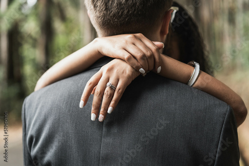 Just Married, woman romantically embracing her partner