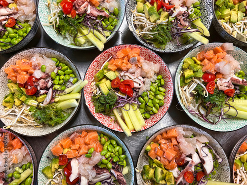 poke bowl with rice vegetables and fresh fish