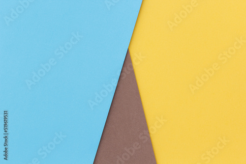 Yellow, blue and brown color paper background