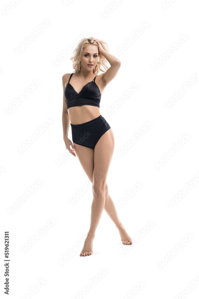 pretty blonde woman in black underwear walk in studio isolated pretty blonde woman in black underwear walk in studio isolated
