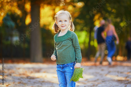 Adorable preschooler girl enjoying nice and sunny autumn day outdoors © Ekaterina Pokrovsky