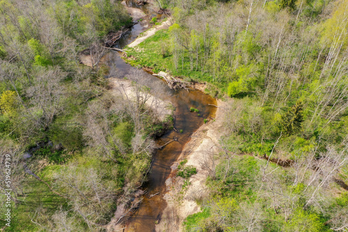 Aerial high angle view of bendy river in spring