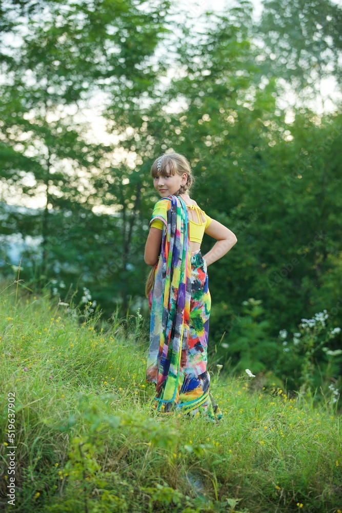A girl of European appearance in a traditional Indian Sari A girl of European appearance in a traditional Indian Sari