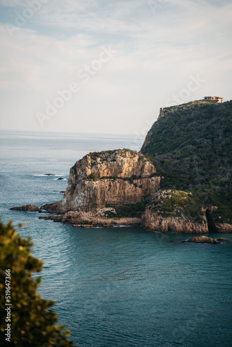 Cliffs & rocks of tropical coast by the ocean