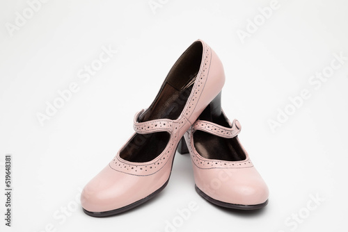 Billede på lærred Studio photo of a pair of pink Mary Jane heels.