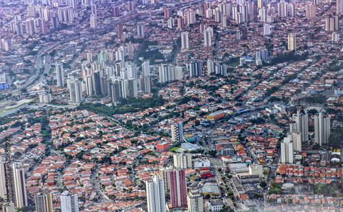 Aerial View near Garulhos Airport arriving in Sao Paulo City. It is an alpha global city and the most populous city in Brazil and world's 12th largest city proper by population. May, 2018