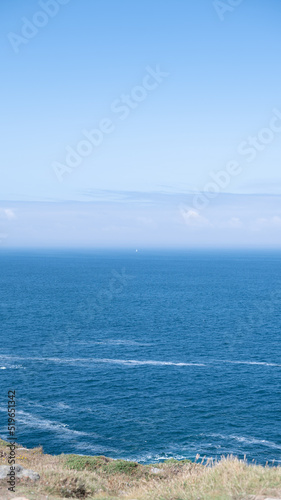 horizon in the sea on rocky beach