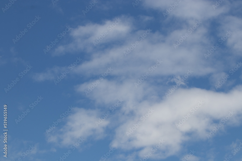 Fluffy Clouds on the clear blue sky in Summer Fluffy Clouds on the clear blue sky in Summer