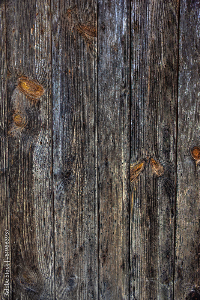 Old wooden planks nailed to a door Old wooden planks nailed to a door