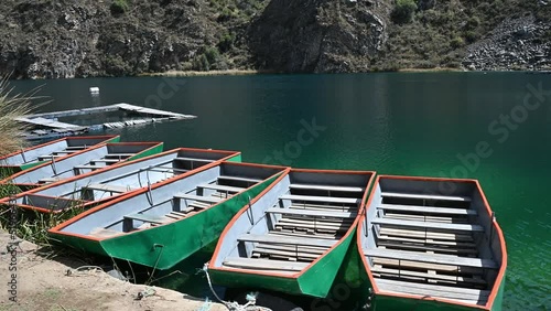 Boat rides on Lake Huallhua located in Huancaya south of Lima - Peru. Clear water. photo