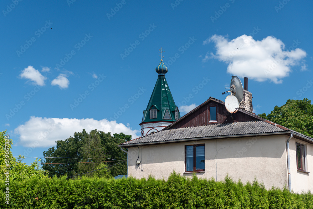 House and Orthodox church in Jaunjelgava, Latvia House and Orthodox church in Jaunjelgava, Latvia