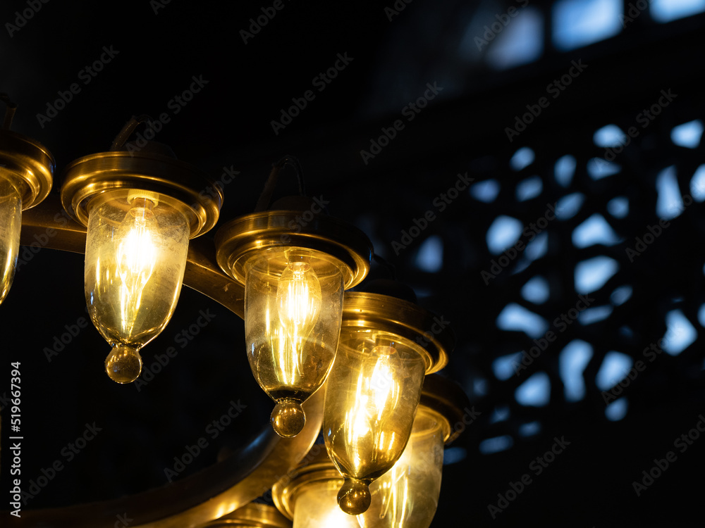 illuminated lamps against a window