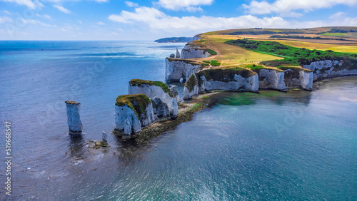 Old Harry Rocks are three chalk formations, including a stack and a stump, located at Handfast Point, on the Isle of Purbeck in Dorset, southern England. They mark the most eastern point of the Jurass
