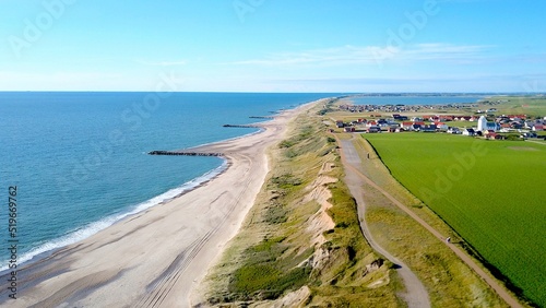 Fotografie, Obraz aerial view along the coast jutland denmark with a view toward the village Ferri