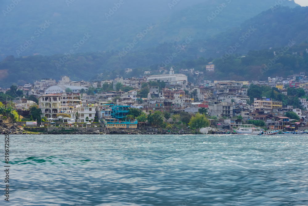 Beautiful view of the Atitlan lake in the Guatemala  - with small towns and tourist boats