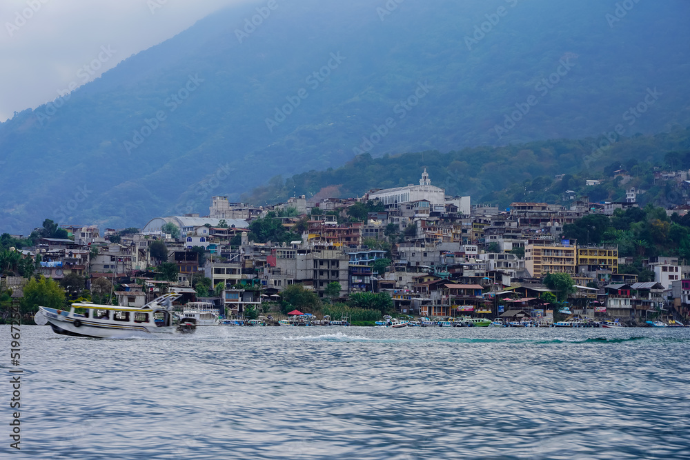 Beautiful view of the Atitlan lake in the Guatemala  - with small towns and tourist boats