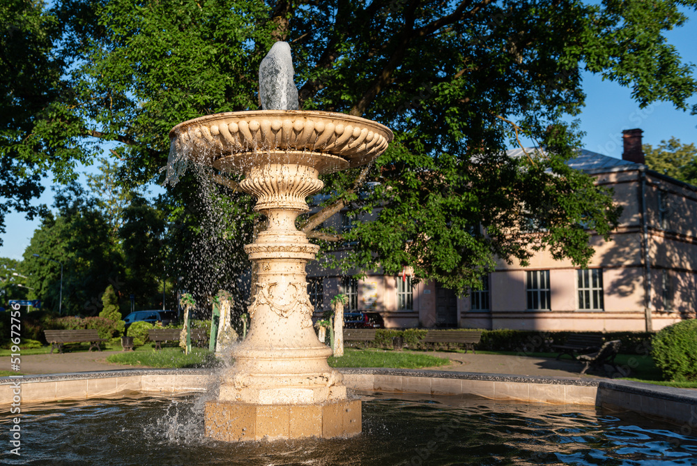 A fountain in the park, on a sunny summer evening, Ilukste, Latvia.
