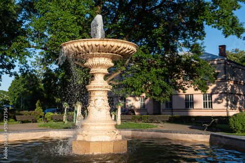A fountain in the park, on a sunny summer evening, Ilukste, Latvia.