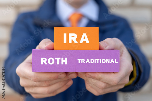 IRA Individual Retirement Account Concept. Choice of Traditional IRA or Roth IRA retirement plans.