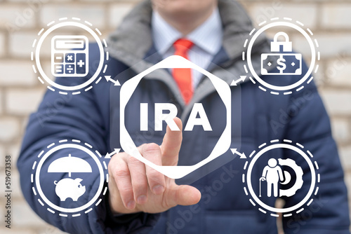 Concept of IRA Individual Retirement Account. Choice of traditional IRA or roth IRA retirement plans. photo