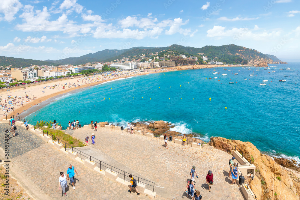View from the 12th century tower of the Spanish castle of the sandy beach coastline and town of Tossa de Mar, Spain View from the 12th century tower of the Spanish castle of the sandy beach coastline and town of Tossa de Mar, Spain