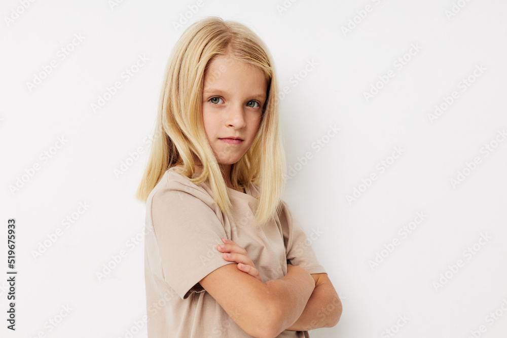 Positive little girl with blond hair kids lifestyle concept Positive little girl with blond hair kids lifestyle concept