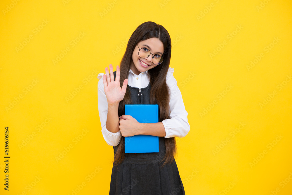Teenage school girl with books. Schoolgirl student. Happy girl face, positive and smiling emotions. Teenage school girl with books. Schoolgirl student. Happy girl face, positive and smiling emotions.