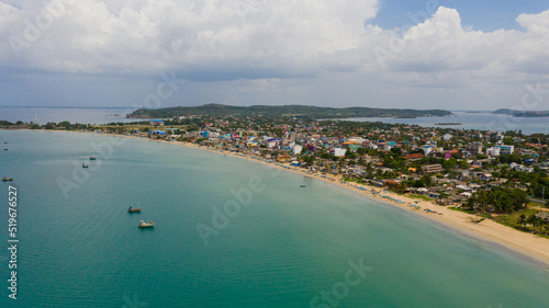 Top view of city of Trincomalee with hotels on the beach. A famous tourist destination in Sri Lanka. photo
