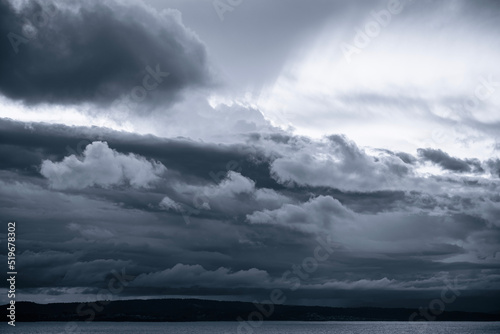 Storm cloud formations over water to horizon as viewed from Montague Island Lighthouse