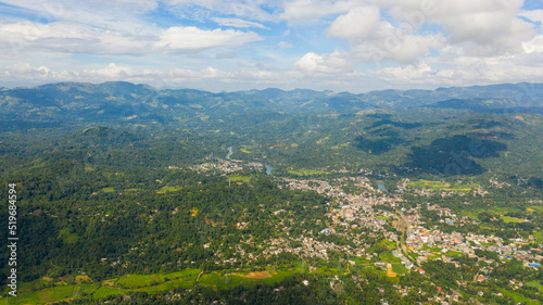 Aerial view of mountain valley with a town and agricultural lands. Gampola Town  Sri Lanka.