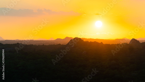 Colorful sunset over jungle and rainforest. Sri Lanka.