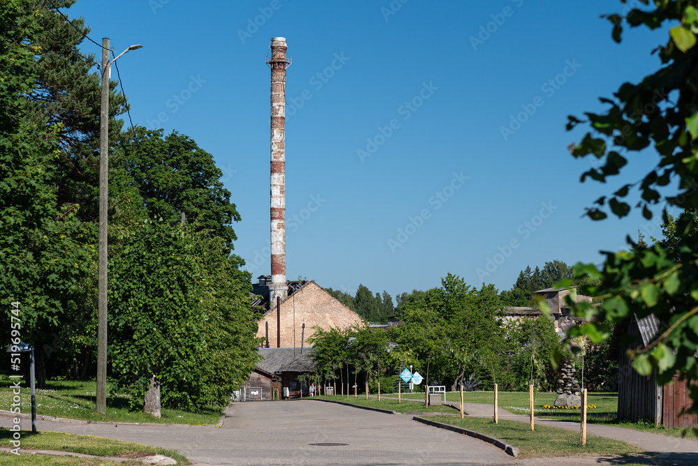 Paper factory with a large chimney in Staicele, Latvia.