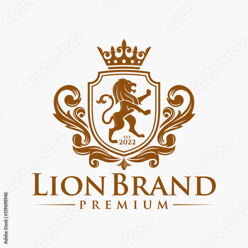Luxury Lion crest heraldry logo. Elegant gold heraldic shield icon. Premium brand identity emblem. Royal coat of arms company label symbol. Modern vector illustration.
