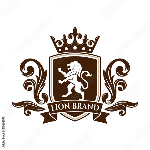 Luxury Lion crest heraldry logo. Elegant gold heraldic shield icon. Premium brand identity emblem. Royal coat of arms company label symbol. Modern vector illustration.