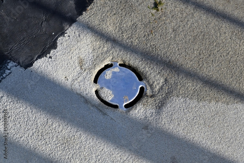 Internal drain from a flat concrete surface on a bridge or building roof