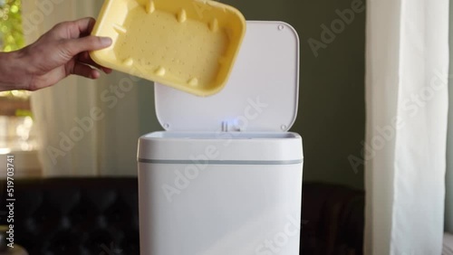Polystyrene container waste. Expanded polystyrene packaging for food. Household waste. Contactless Smart Touch Trash Can