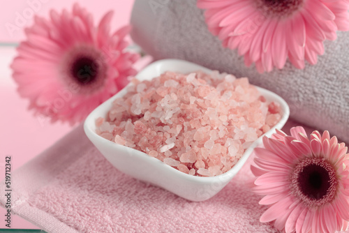 Spa composition with pink salt.