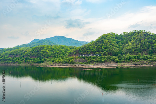 green mountain with river water reflection at morning from flat angle