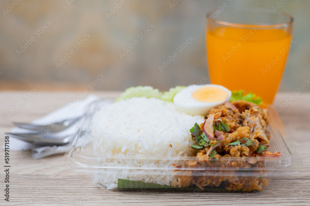 Thai food, pork larb rice with vegetables and dipping sauce