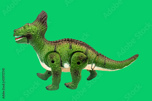 Fototapeta Naklejka Na Ścianę i Meble -  Dinosaur toy on green screen background. Take a photo and cut the background and overlay with green screen and there are also clipping path.