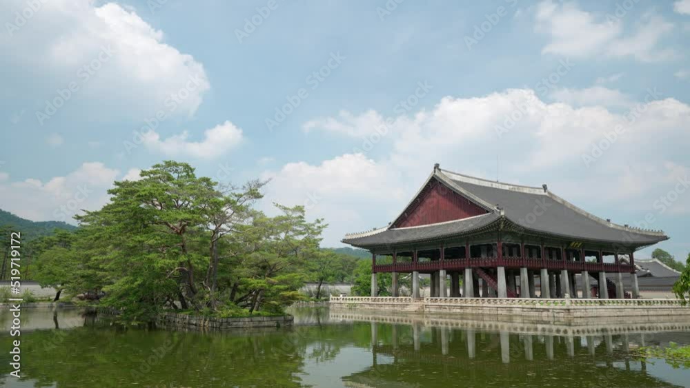 Gyeonghoeru Pavilion of Korean architecture taken on summer against white fluffy clouds with copy space Gyeonghoeru Pavilion of Korean architecture taken on summer against white fluffy clouds with copy space