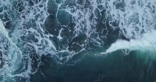 overhead drone shot of sea waves on the Hindia Ocean. sea ​​foam 4K videos. abstract footage. photo