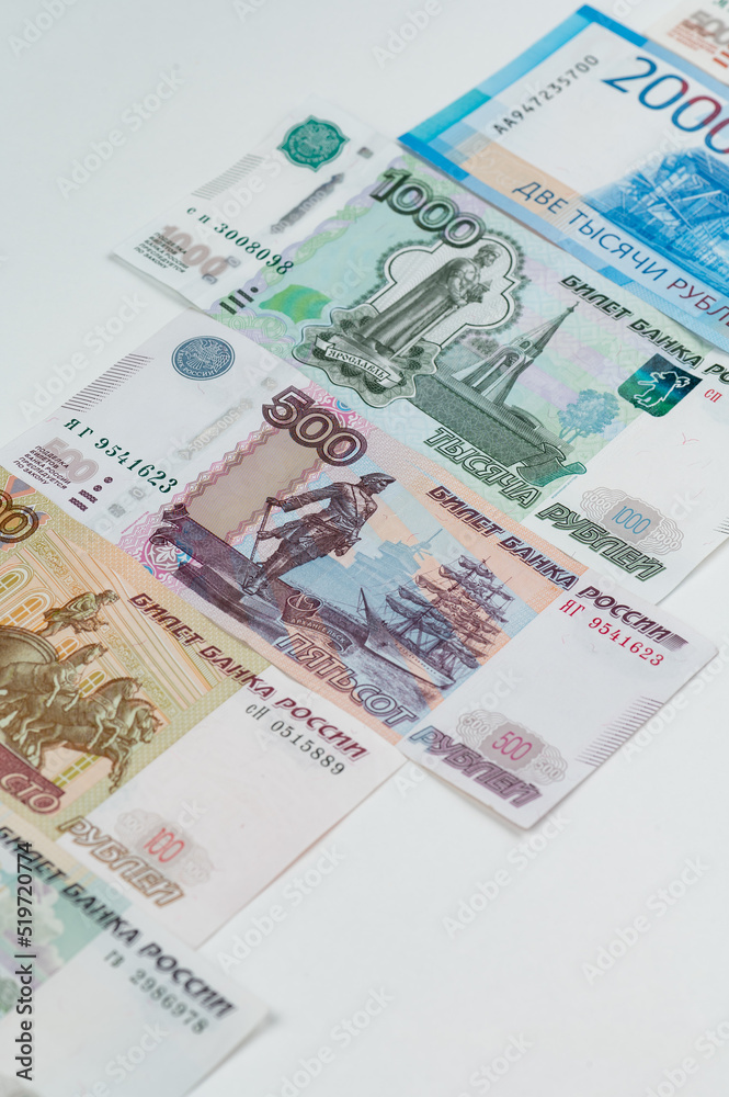 Russian rubles background. Money background and texture. Banknotes of different denominations Russian rubles background. Money background and texture. Banknotes of different denominations